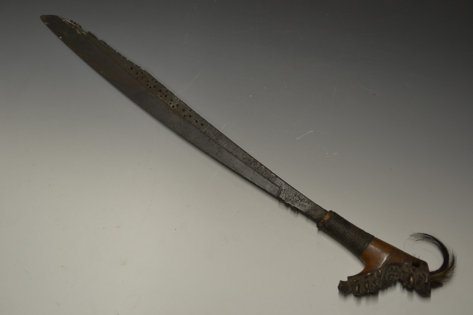 A Dayak sword, 55.