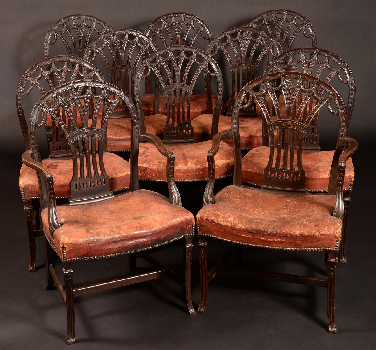 A set of ten Hepplewhite design mahogany dining chairs,