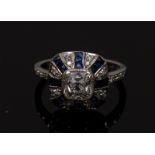 An Art Deco diamond and sapphire pyramid cluster ring, central cushion cut diamond approx 1.