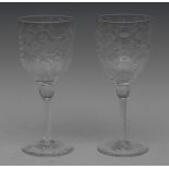 A pair of Webb Corbett wine glasses, the bucket shaped bowls,