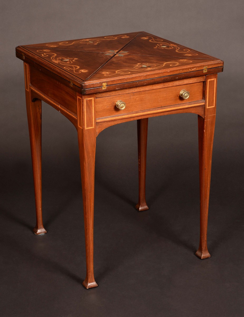 An Edwardian mahogany, marquetry and mother of pearl inlaid envelope card table,