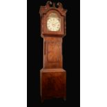 A Victorian mahogany longcase clock, curly pediment to hood with brass paterae,