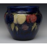 A large Moorcroft Wisteria pattern jardiniere, tube lined with large flowerheads and foliage,