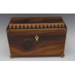 A 19th century sarcophagus walnut tea caddy, the cover inlaid with shell patera,