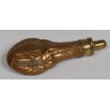 A 19th century copper and brass shot flask, embossed with stiff acanthus,