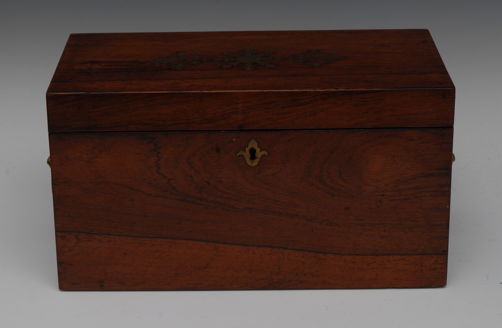 A Regency rosewood and brass marquetry rectangular tea caddy,