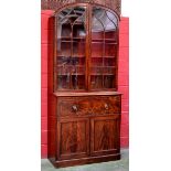 A mahogany domed topped secretaire bookcase, astragal glazed doors enclosing shelving to top,