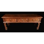 An 18th century oak low sideboard, moulded rectangular top,