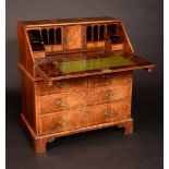 An '18th century' walnut and feather crossbanded bureau,