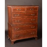 A George III mahogany crossbanded oak chest on chest, of unusually small proportions,