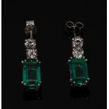 A pair of emerald and diamond earrings, two stone round brilliant cut diamond stud link,