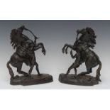 After Cousteau (19th century), a pair of dark patinated bronzes, The Marley Horse Tamers,
