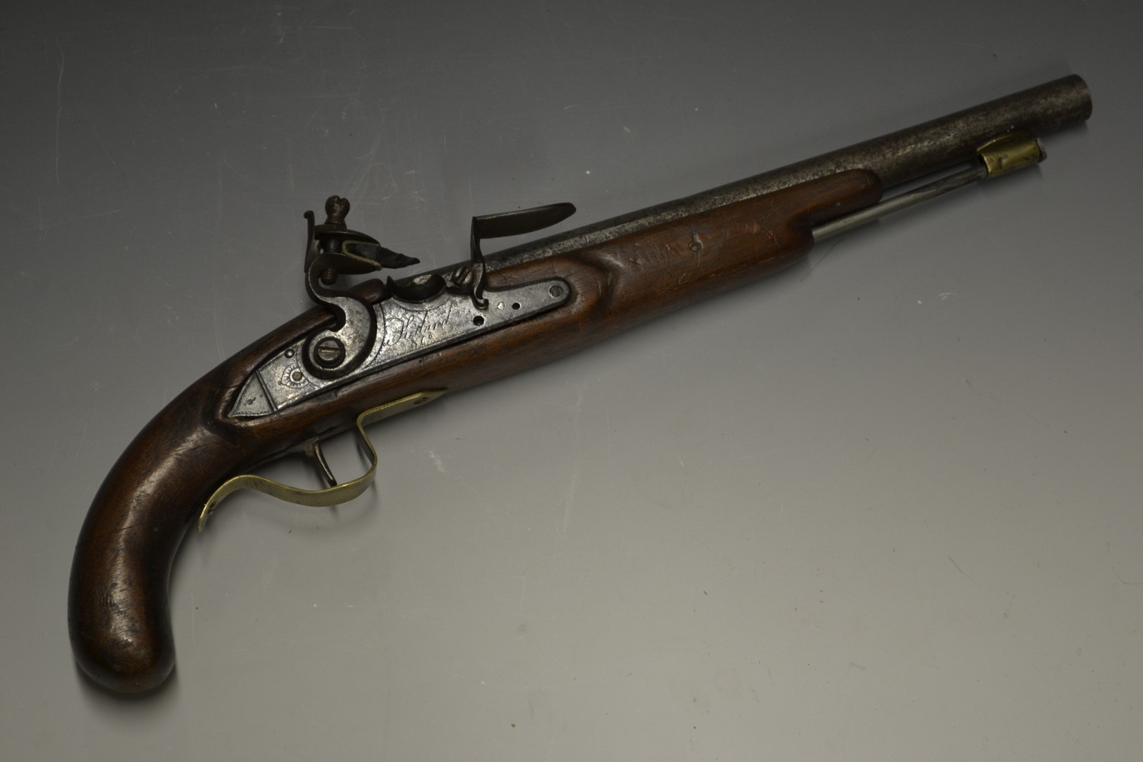 A flintlock pistol, 30.