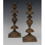 Judaica - a pair of 19th century brass Shabbat (Sabbath) candlesticks, probably Polish,
