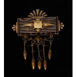 A 19th century Aesthetic Movement articulated brooch, central rectangular ten section panel,