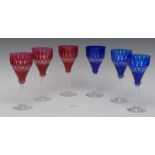 A set of six Walsh wine glasses, in blue and red, hobnail cut bowls, clear stems, 19.
