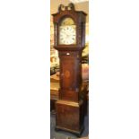 A Victorian oak inlaid longcase clock, curly pediment with carved paterae to hood,