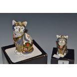 A Royal Crown Derby Fireside Cat paperweight, exclusive to Peter Jones, boxed, certificate,