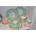 A Royal Crown Derby Vine pattern cup and saucer; a pair of wavy edged plates;