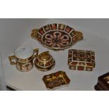 A Royal Crown Derby 1128 pattern trinket box and cover; a loving cup; table cigarette lighter;