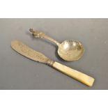 A Victorian silver butter knife, mother-of-pearl handle,