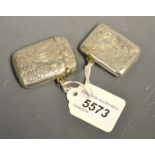 A George V bowed rectangular silver vesta case, profusely engraved with clover, shaped cartouche,