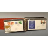 Stamps, ring bound album of First Day Covers,