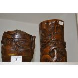 A carved bamboo brush pot;