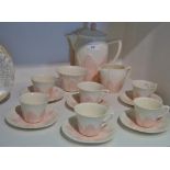 A Solian Ware Soho Pottery coffee service, in relief with pink leaves,