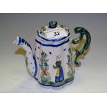 A Quimper lobed spreading cylindrical teapot and cover, decorated in the typical manner,
