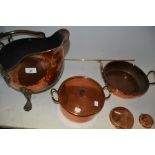 Metalware - a copper coal bucket, brass handle, paw feet; a copper pan,
