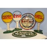 Advertising - a cast iron Land Rover plaque; a cast iron Norton Bikes sign ; Castrol, Shell,