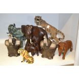 Animal Models - a stoneware Tiger; a hardwood Tiger; a pair of carved wooden Elephants;