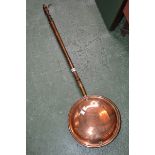 A copper warming pan