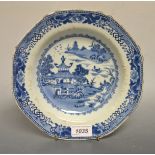 A Nanking Cargo octagonal bowl, underglazed blue, decorated in with a willow pattern type landscape,