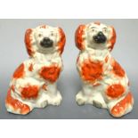 A pair of Victorian Staffordshire mantel dogs, 15cm, c.