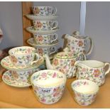 A Minton Haddon hall tea service for six comprising bachelor teapot, hot water jug, sugar bowls,