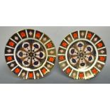 A pair of Royal Crown Derby Imari 1128 pattern dinner plates, 27cm diameter, printed marks in red,