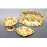 Royal Winton Chintz, a Sweet Nancy pattern shaped oval bowl; a sweet meat dish; a small comport,