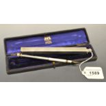 An Edwardian silver novelty travelling writing companion, comprising a pen,