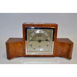 An Elliott walnut mantel clock retailed, Ratcliffe,