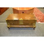 An oriental trunk on stand, single drawer, carved feet,