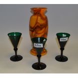 A Murano type marbled orange glass tapering baluster vase;