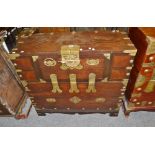 An Oriental marriage chest, fall front revealing niches, four drawers above large cavity,