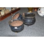 A pair of cast iron cauldrons; another;