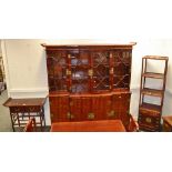 An oriental cross hatch bamboo veneered dresser, upswept cornice, glazed top, four doors,