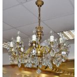 A 20th century gilt metal twelve light, twelve arm ceiling chandelier,