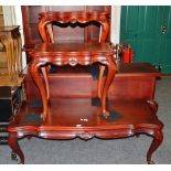 A 20th century mahogany coffee table, , shaped top, shell patera,