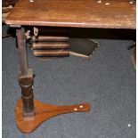 An early 20th century rectangular over bed table,height adjustable ratchet mechanism ,