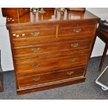 A late Victorian chest of drawers, two short over three long drawers, stepped top,